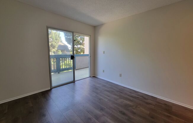 Top Floor Penthouse Loft Condo | Fireplace | Laminate Flooring | Community Swimming Pool