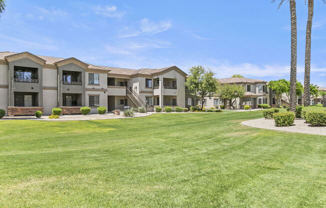 Lush landscaping throughout the property at Adiamo Palm Valley, Arizona, 85395