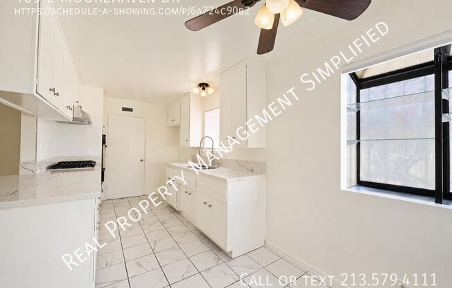 409 E MOOREHAVEN DR