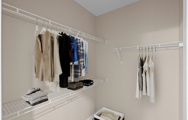 a walk in closet in a 555 waverly unit