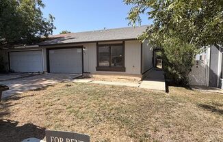 Renovated 2 bedroom/2 bath duplex with garage and fenced yard