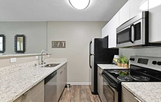 Patchen Oaks Apartments - Updated Kitchens with Stainless Steel Appliances
