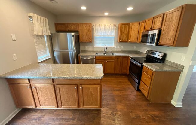 Charming 3 bdrm/ 2.5 bthrm End Unit Townhome!