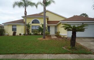 Spacious 3 Bedroom/2 Bath home in a gated community at Meadow Woods Village in Orlando Florida