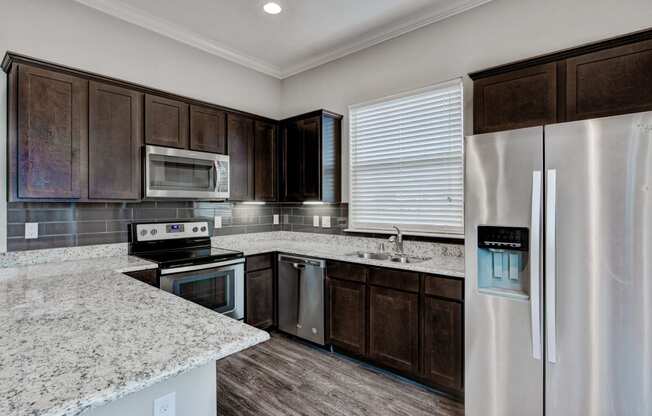 Horizon at Premier apartment interior kitchen with stainless steel appliances Horizon at Premier apartment interior kitchen with stainless steel appliances