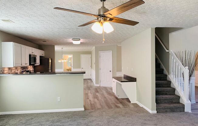 Prime location! 4 bed, 2.5 bath, LVP flooring, stainless appliances, ceiling fans, arched door ways, vaulted ceilings, must see!