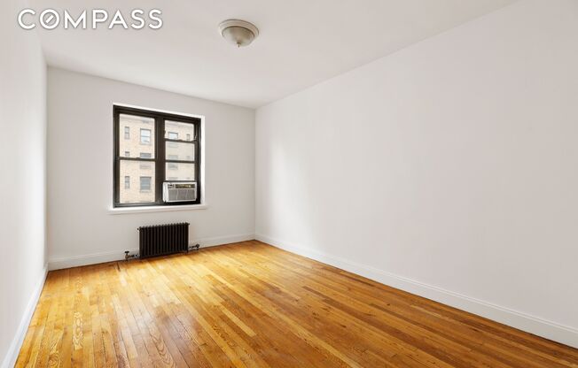 312 W 23 ST