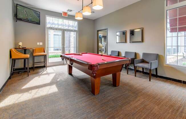 our apartments have a game room with a pool table and a flat screen tv at Riverset Apartments in Mud Island, Memphis, TN
