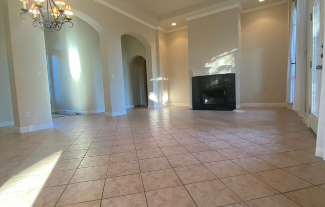 BEAUTIFUL CUSTOM ONE STORY HOME WITH WROUGHT IRON GATE COURTYARD ENTRY.