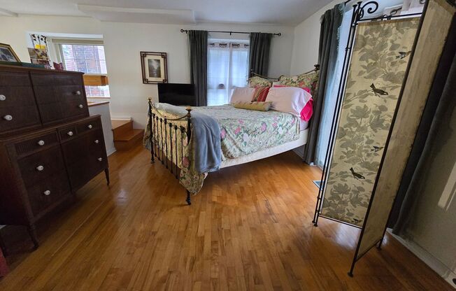 BEAUTIFUL BRIGHT TRI-LEVEL APARTMENT - OFF STREET PARKING INCLUDED AVAILABLE SEPT 10!
