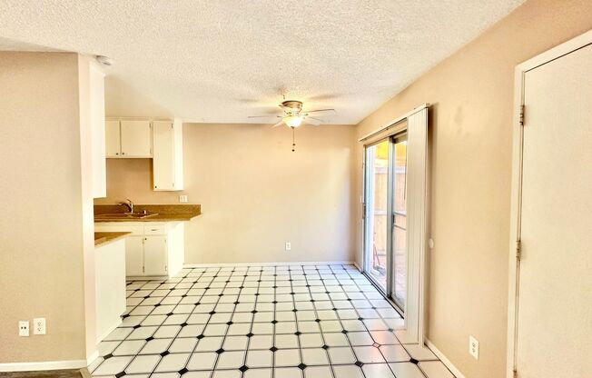 Quiet End Unit in Lovely HOA Community, Complete with Garage, Fenced Yard Space, & Community Pool & Spa!