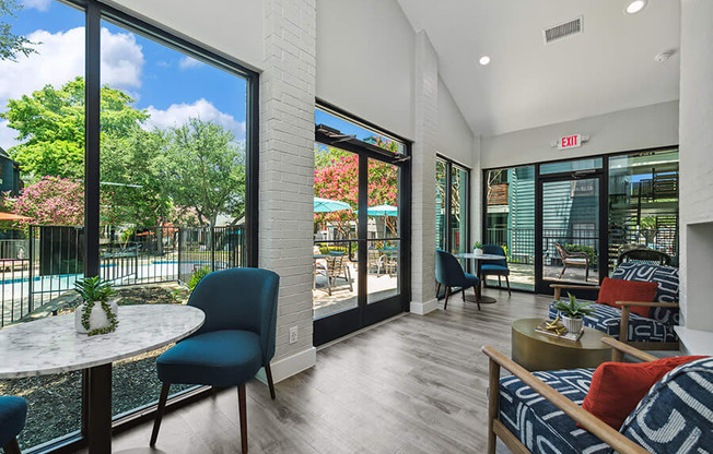 Community Clubhouse with Lounge Furniture at Bridges at Deer Run Apartments in Dallas, TX.