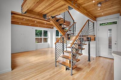 INDUSTRIAL-STYLE QUEEN ANNE TOWNHOUSE WITH VIEWS OF THE WATER FROM EVERY FLOOR!
