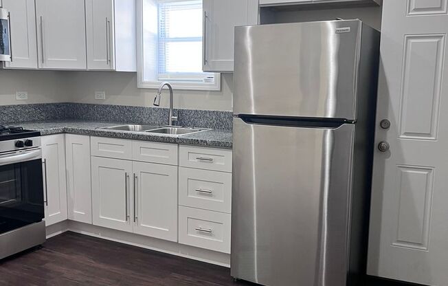 [5026-32] W Madison LLC