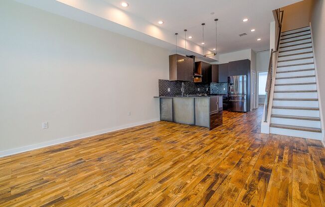 Three Bedroom Modern Olde Kensington Condo with Roofdeck