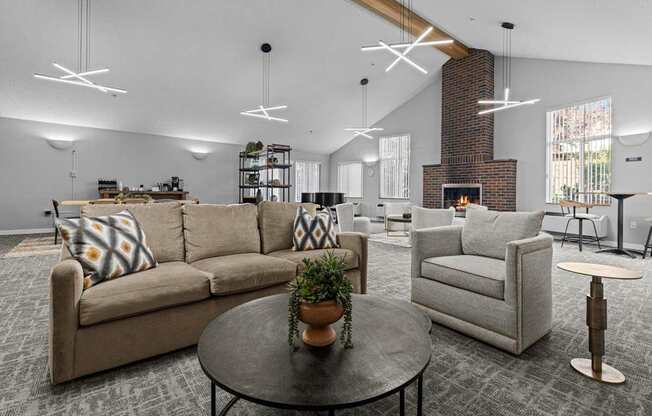 A living room with a couch, chair, and coffee table.