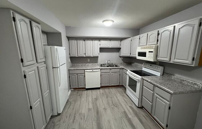 Cozy 3 Bedroom Home with Spacious Yard and Peach Tree!