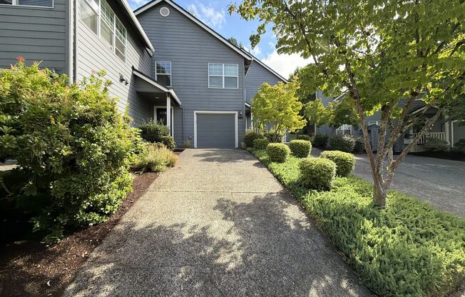 Bright Cedar Mill Townhome-Style Home with Vaulted Living Room, Skylight, Garage & Modern Kitchen