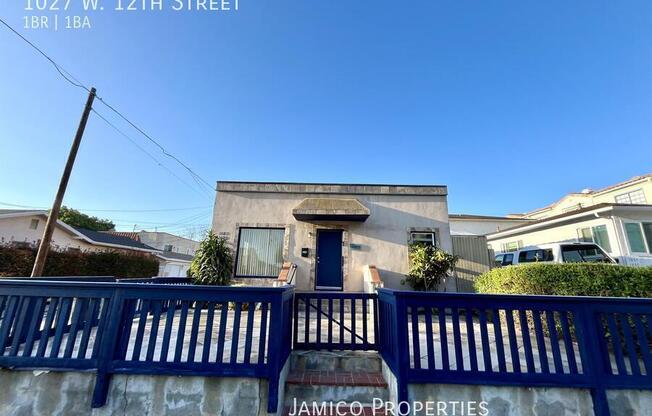 1027 W 12 ST