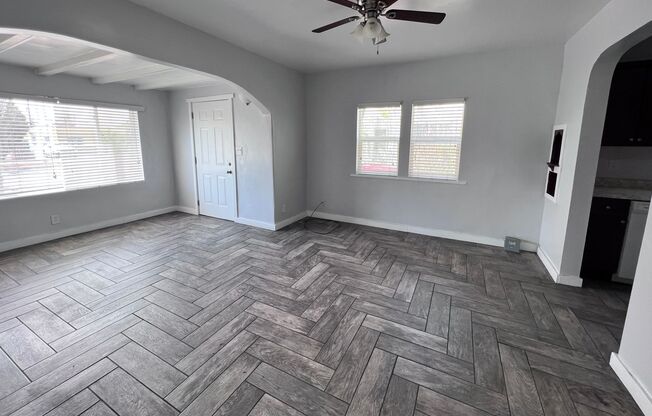 3 Bedroom, 2 Bath w/ kitchen appliances, large storage room and off-street parking