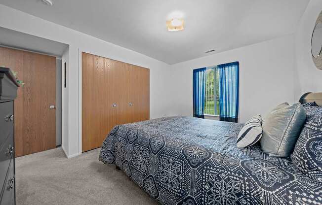 Spacious bedroom at Westwood Village Apartments in Westland, MI