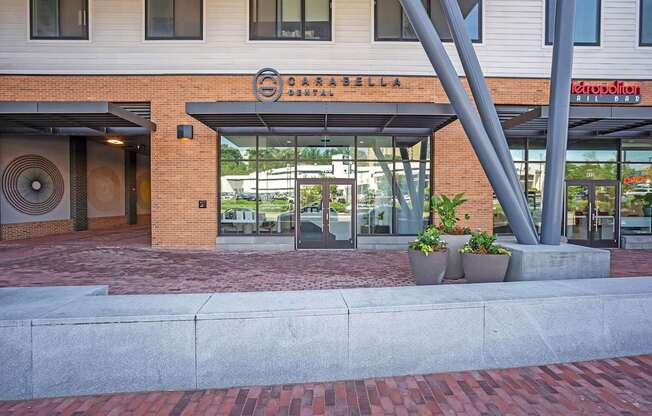 The image shows a building with a sign that reads