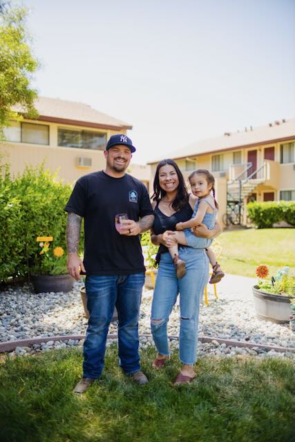 Residents smile on the grounds at Cranbrook.