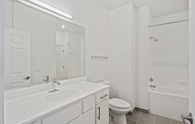 renovated bathroom with DalTile flooring