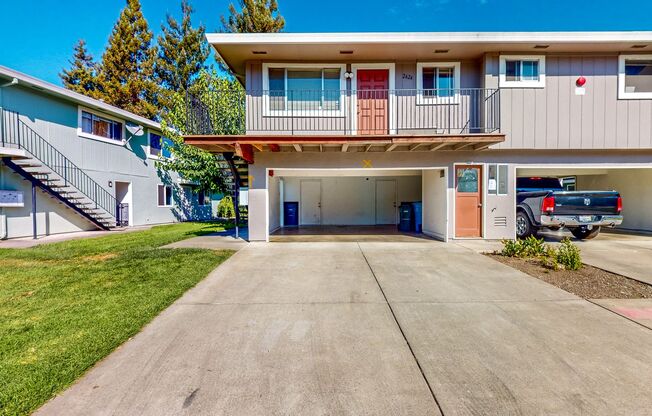 2 story 2 bedroom 1 bath condo with covered parking, private storage and community pool!