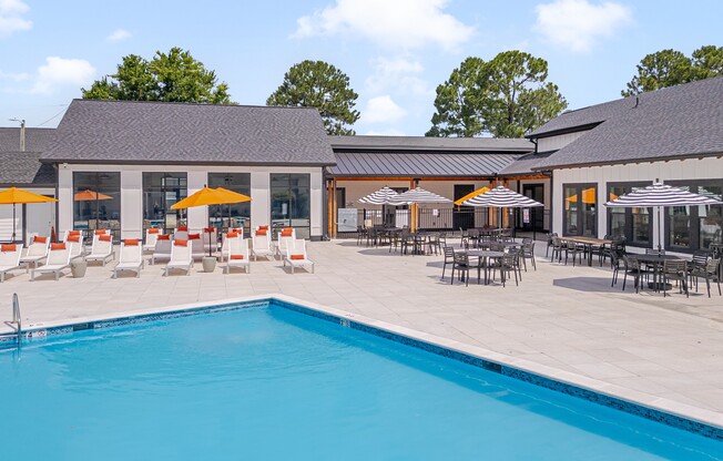 Dive into luxury living at Crossings @ 501 Apartments. Relax by our sparkling pool surrounded by stylish lounge areas and vibrant sunshades. Ideal for socializing or unwinding. Schedule a tour today and envision your new lifestyle!