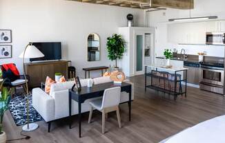 a living room with a couch and a table