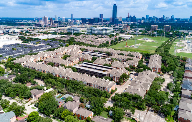 aerial view of the apartment community and surrounding city