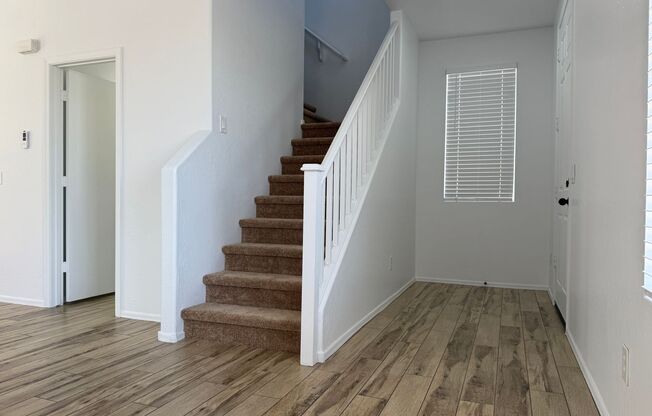 51st Ave and Broadway, 3 bed, 2.5 bath, Freshly Painted, wood like tile downstairs, new carpet