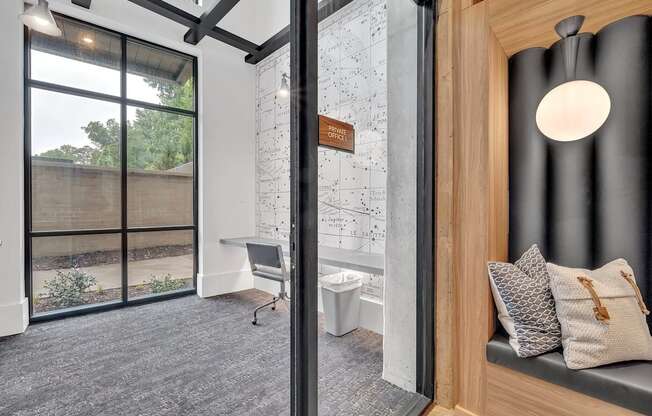 a bathroom with a shower and a toilet and a window