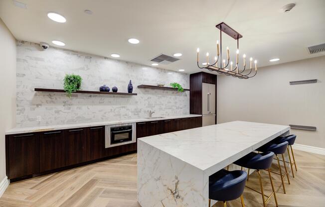 a kitchen with a table in a room