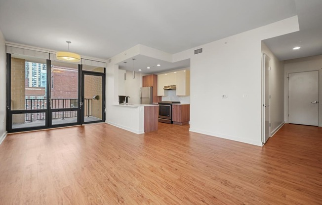 Modern kitchen with hardwood floors with tons of space apartments downtown Chicago 60654 at Hensley Chicago, Illinois