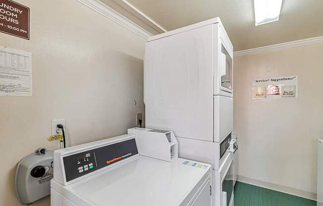 A laundry room with a washing machine