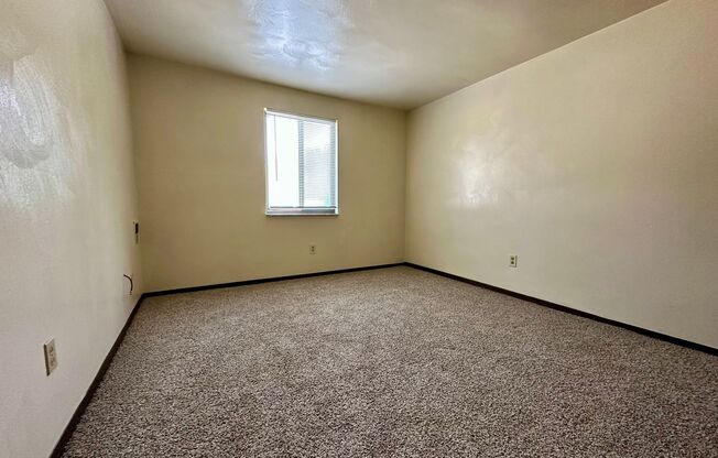 Spacious One Bedroom Apartment! Laundry On-Site, Built-In A/C & More! Call Today!