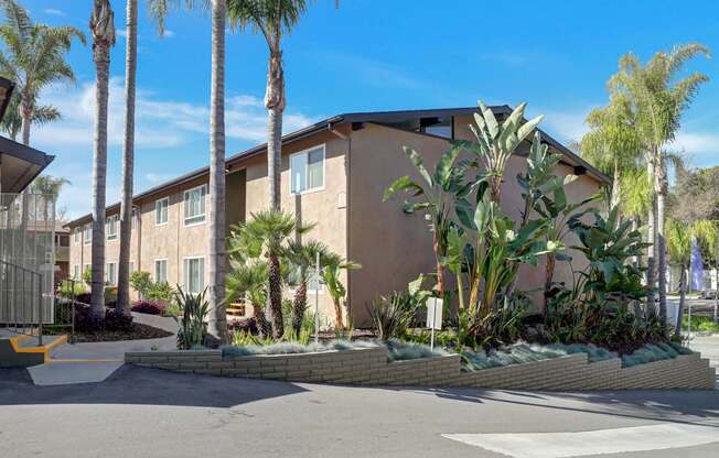 Building to the left coming out of the property