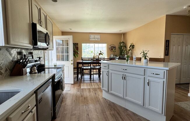 Occupied, do not disturb tenants. West Valley 3 br 2ba Dbl garage, LVP flooring and more!