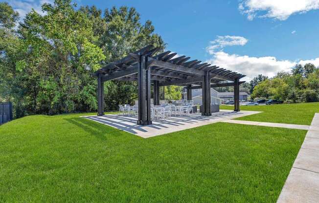 a rendering of a steel structure in the middle of a lawn at The Lorient Apartments, Florida