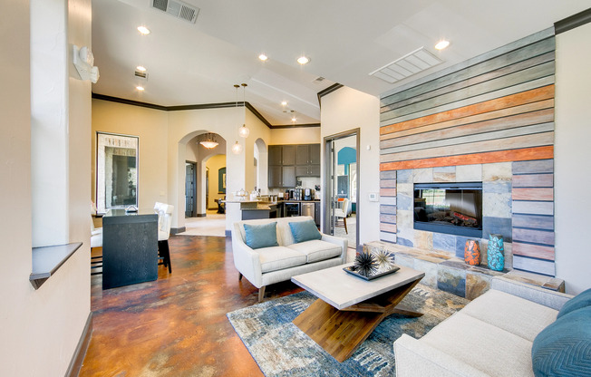 View of Clubhouse, Showing Seating Area, Coffee Bar, and Fireplace at Enclave on Golden Triangle Apartments