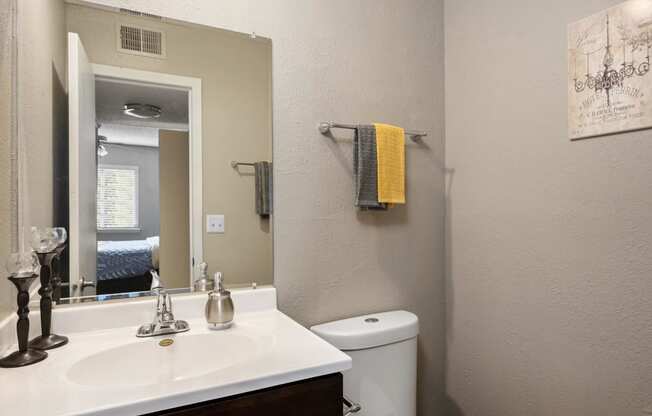 Bathroom With Light Grey Walls & Espresso Vanity