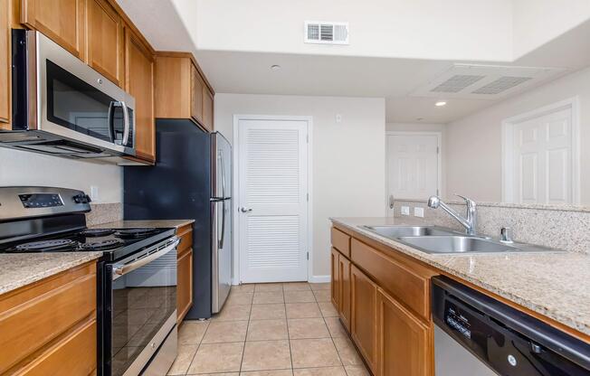 a kitchen with a stove top oven