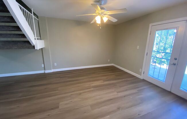 Inviting 3-Bed, 2.5-Bath Townhome: Newly Upgraded with Luxury Vinyl Plank Flooring, Stainless Steel Appliances, Ample Storage, and Access to Community Pool
