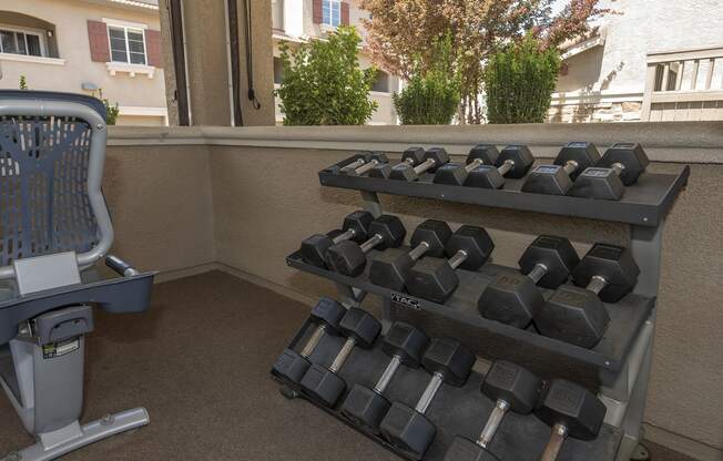 fitness center with dumbells