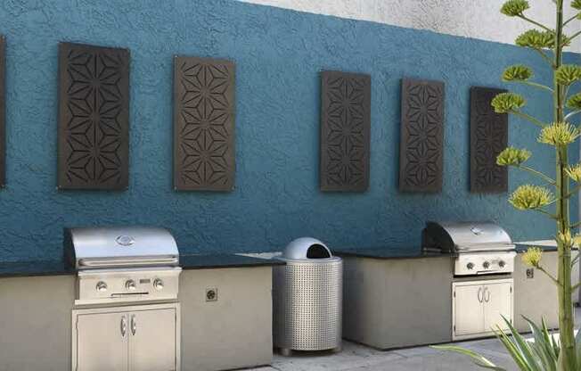 A wall with a blue background has a patterned design on it.