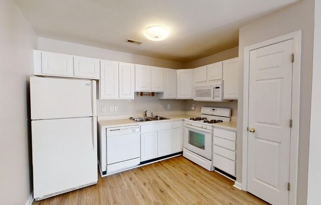 Townhome | Hard Surface Floors Through-Out The Home | Washer/ Dryer Included |Assigned Parking | Community Pool