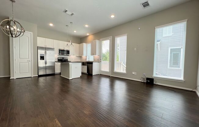 Introducing a stunning and impeccably maintained townhome that radiates the allure of modern luxury and comfort!