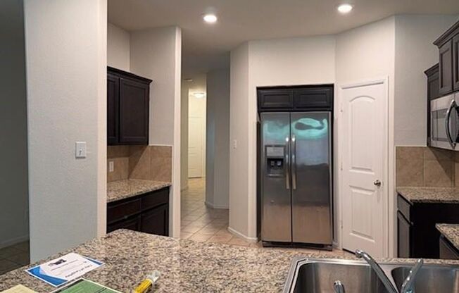Enjoy the comfort and privacy of this well-maintained 4-bedroom, 2-bath home situated at the end of a quiet street with no through traffic.